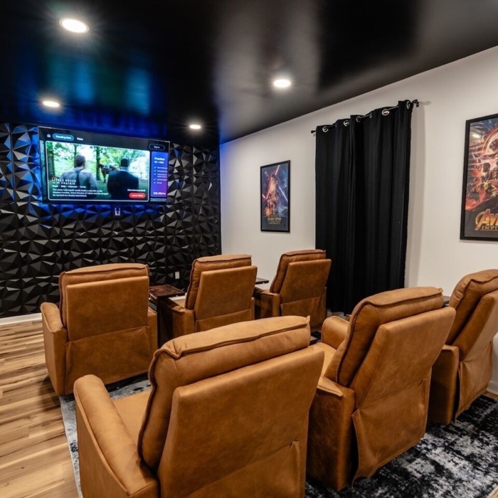 Movie room theater seating at Cedar Escape