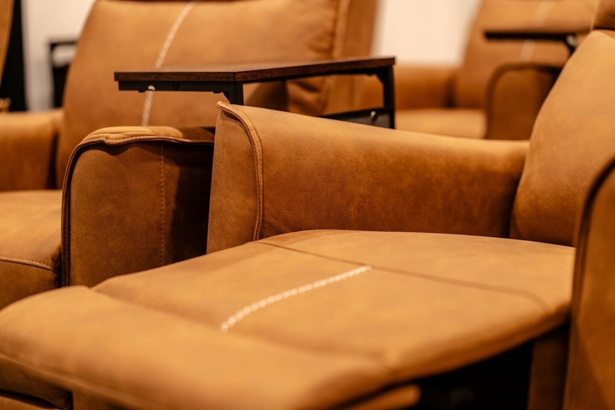 Close-up of leather theater recliners in the movie room