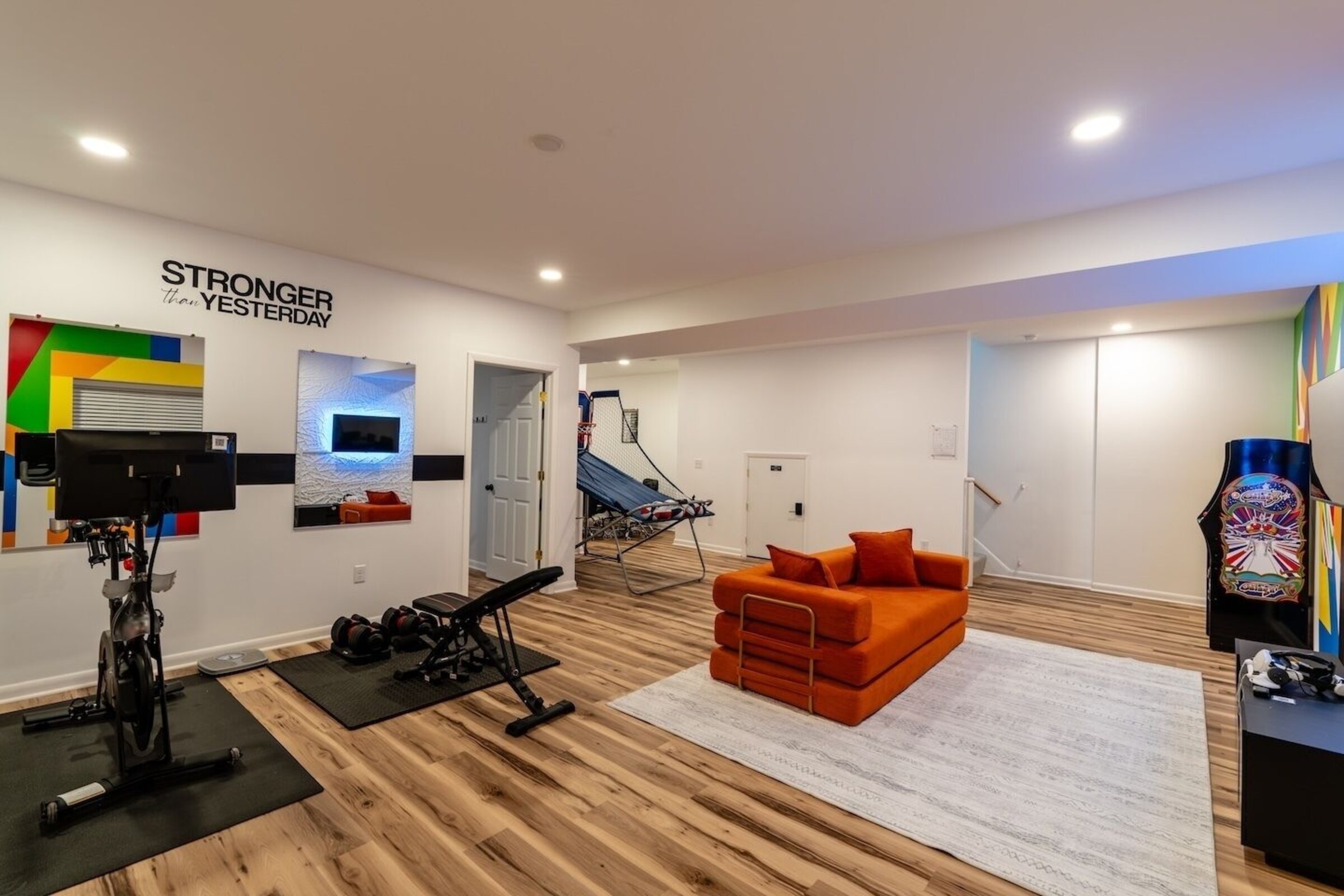 Home gym with exercise bike and weight bench at Cedar Escape