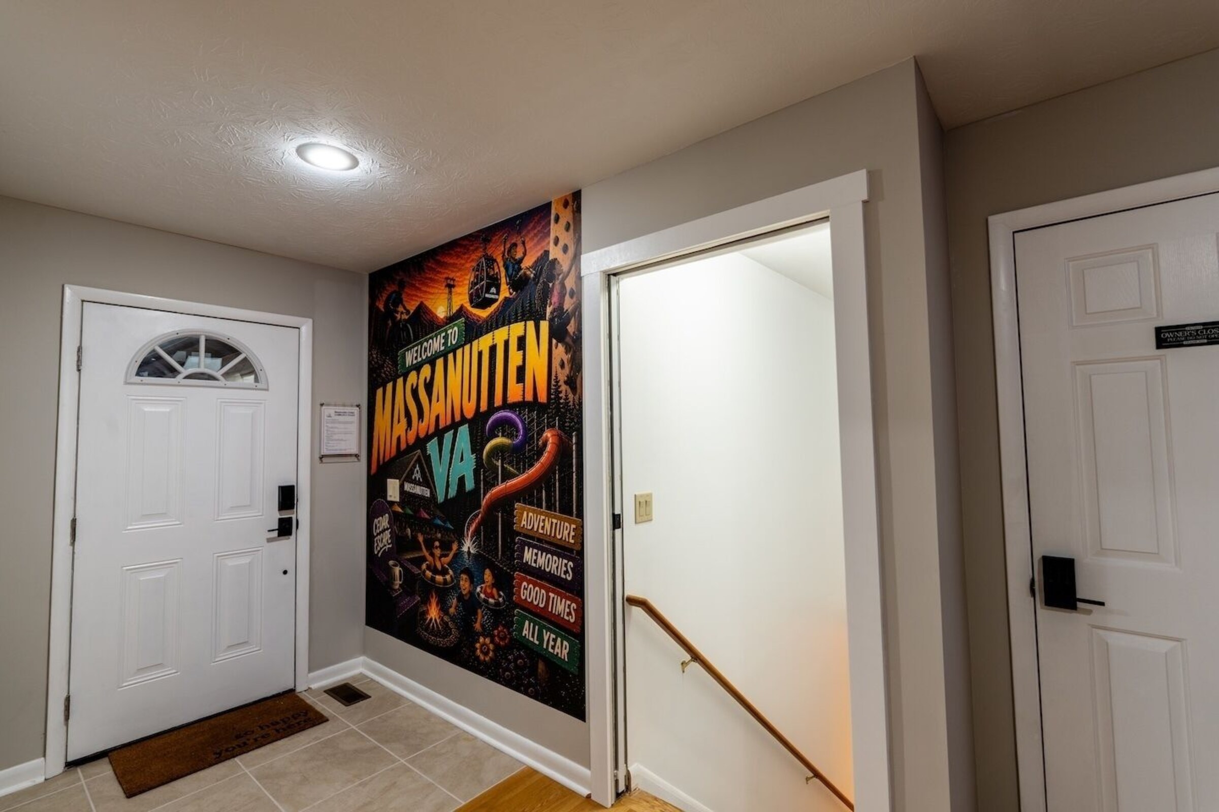 Entry foyer with Massanutten mural and stairs to the lower level